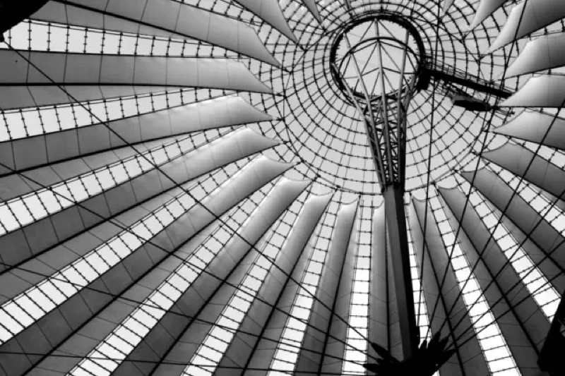 Capturing the beauty of modern design from below! 🌟 This stunning circular canopy radiates elegance with every panel cat